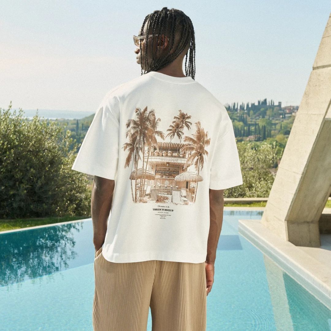 The Couture Club Beach Club Graphic T-shirt Off White/Bruin